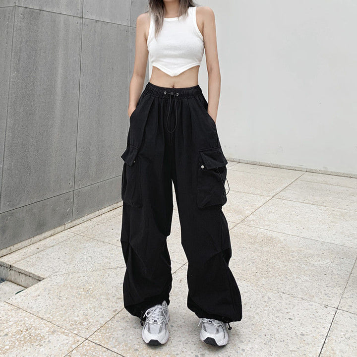 Women's wide cargo pants with tunnel drawstring, adjustable hem, and multiple pockets Mune Fashion