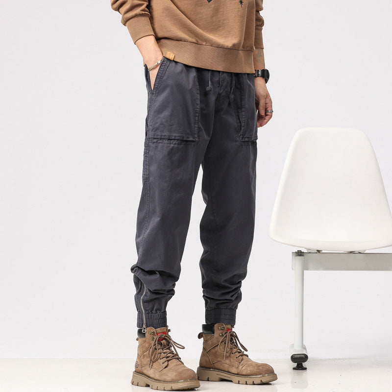 Men's workwear cargo pants in tech jogger style with applied front pockets, hammer loop, and ankle zippers Drune
