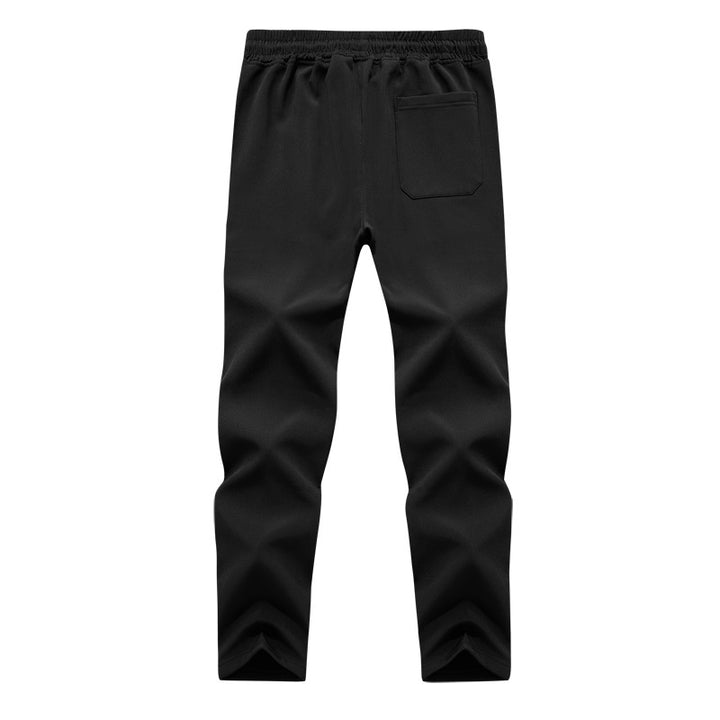 Men's Tapered Tech Jogging Pants with Elastic Waistband, Zipper Pockets, and Breathable Functional Material Mune Fashion