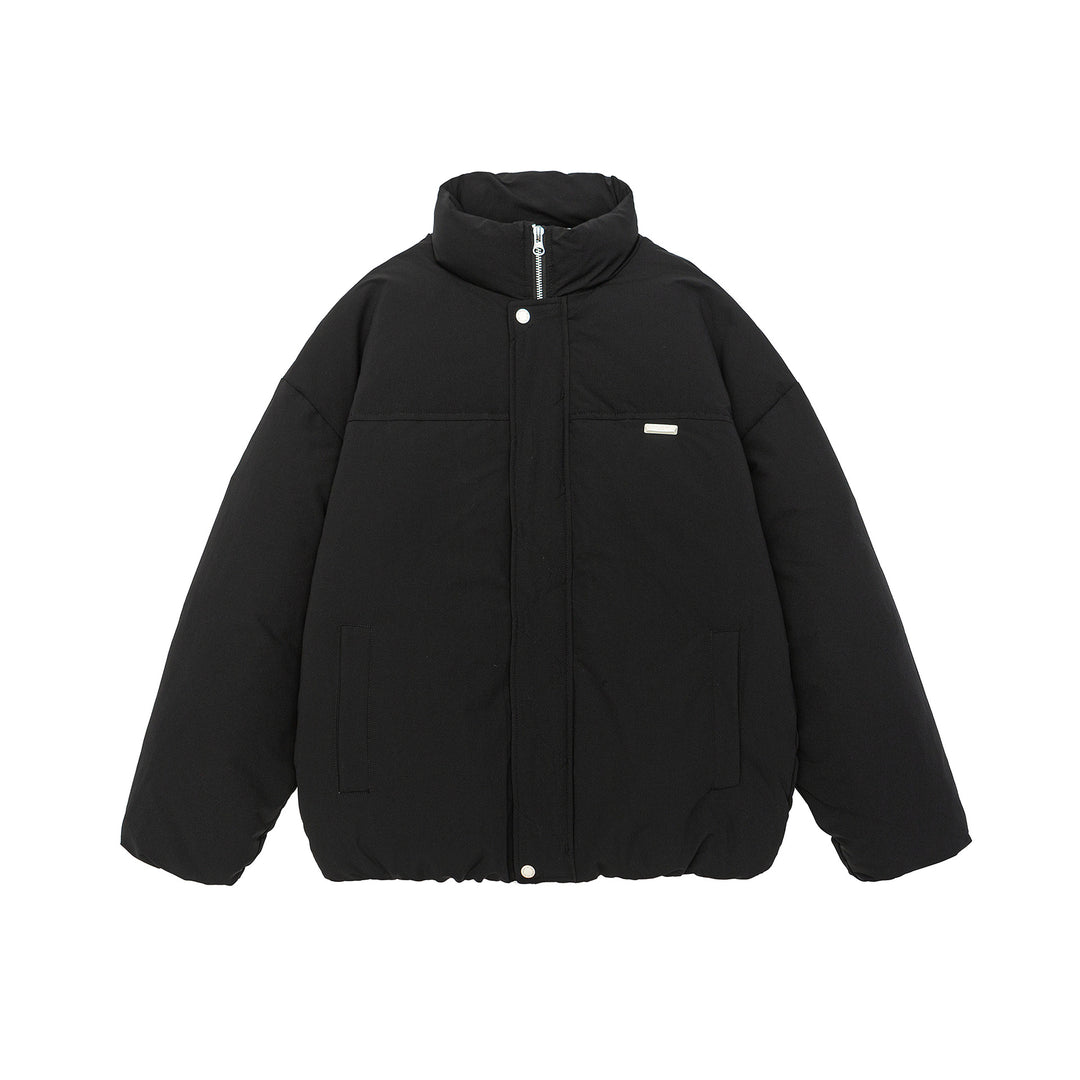 Women short cut oversized quilted jacket with high stand-up collar and concealed zipper Mune Fashion