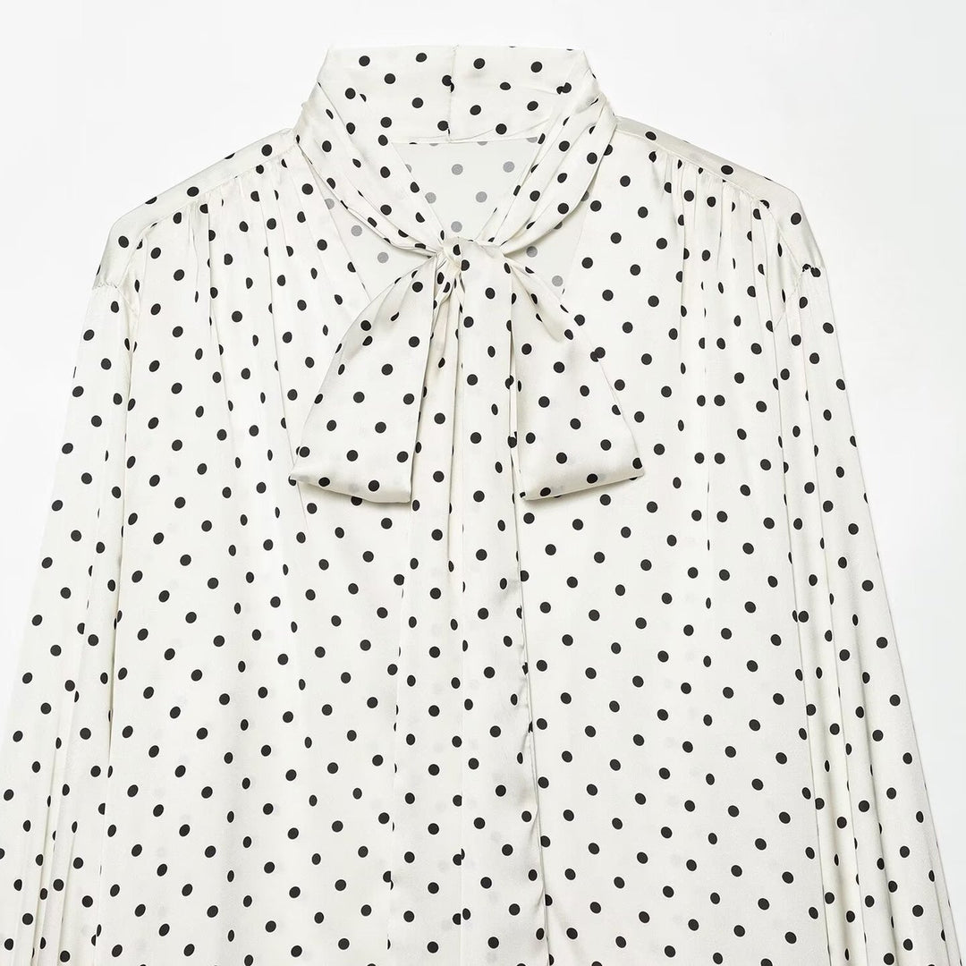 Women's blouse with bow collar, polka dot pattern and flounce sleeves Mune Fashion