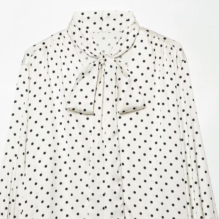 Women's blouse with bow collar, polka dot pattern and flounce sleeves Mune Fashion