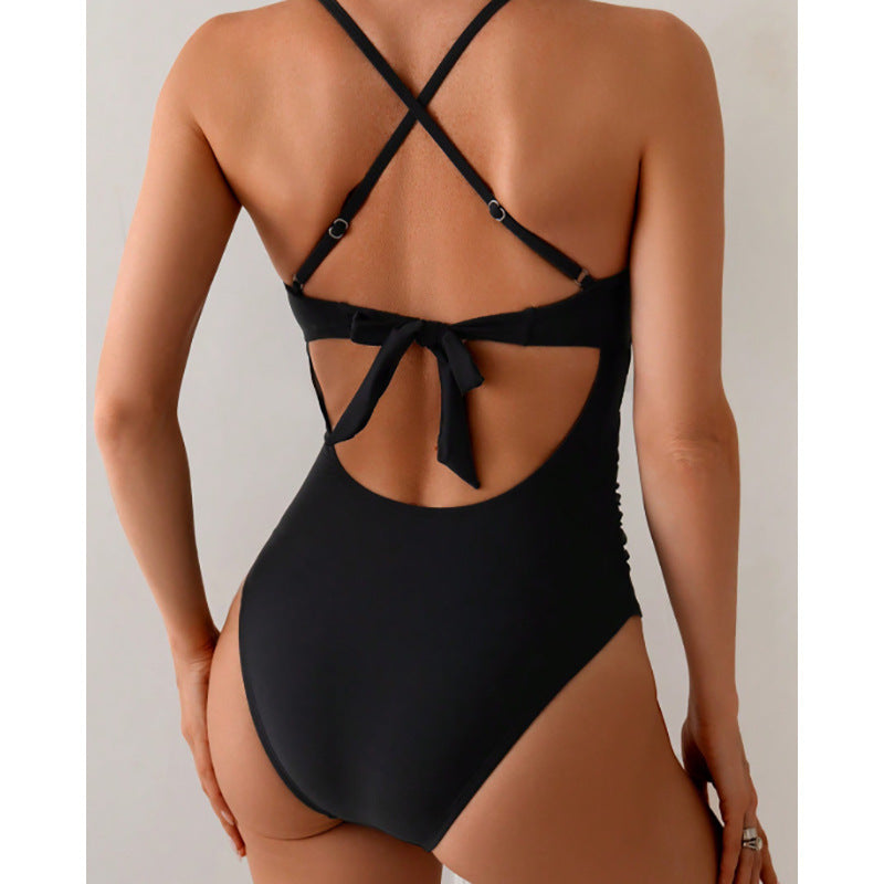 Women's one-piece swimsuit with seductive V-neckline and elegant decorative trim Mune Fashion