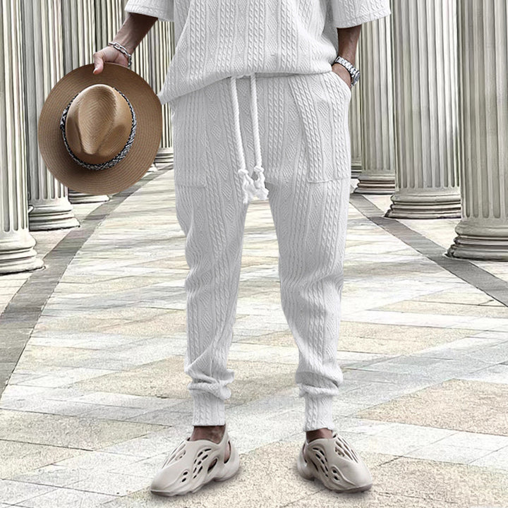 Men's cable-knit joggers with drawstring, patch pockets, and ribbed cuffs Mune Fashion
