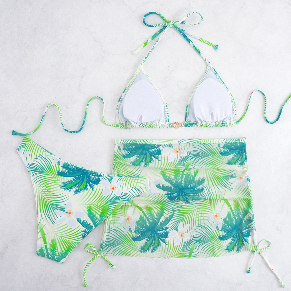 Ladies bikini set with elegant wrap skirt and tropical design Mune Fashion
