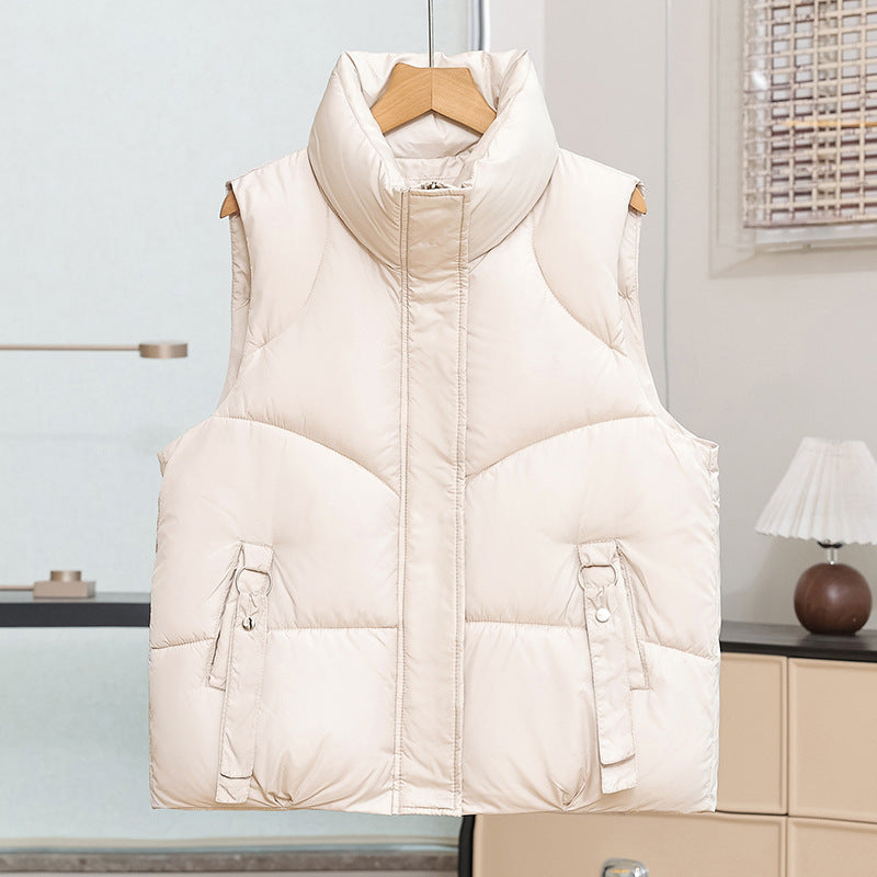 Women's padded quilted vest with high standing collar and decorative ring loops Mune Fashion