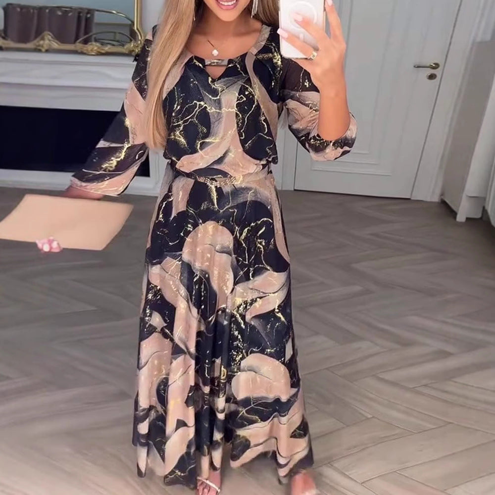 Ladies' maxi dress with abstract marble print, chiffon overlay, keyhole neckline and elastic waist yoke Mune Fashion