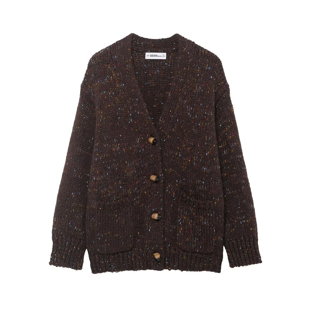 Women’s chunky knit cardigan with horn button front and patch pockets Mune Fashion