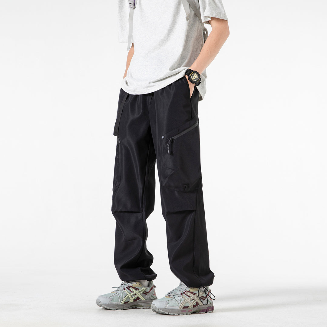 Men's Loose Utility Cargo Pants with Elastic Waistband, Zipper Pockets, and Adjustable Hem Drune
