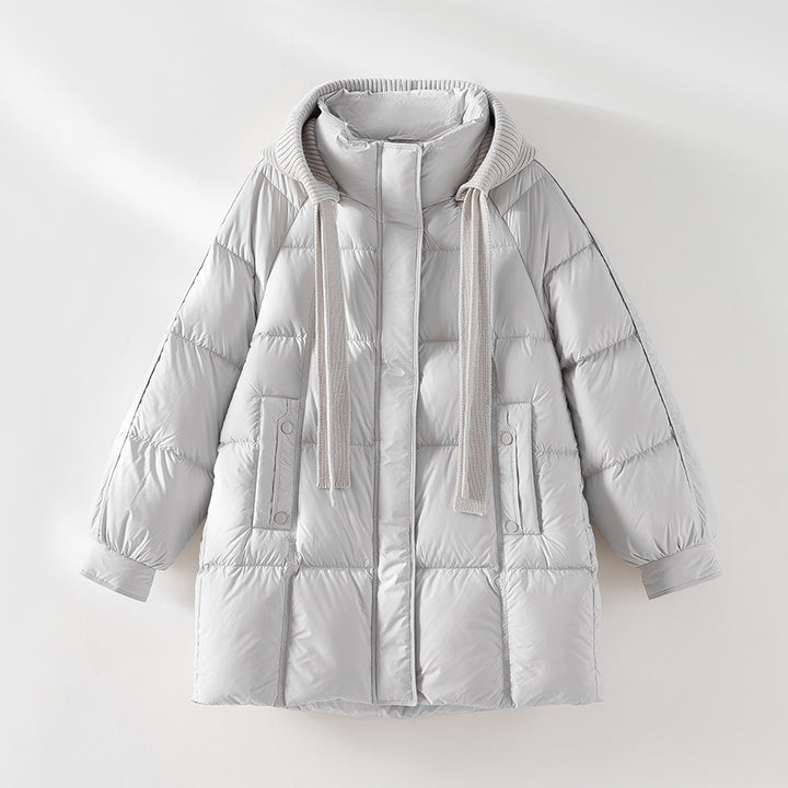 Women's padded quilted jacket with hood ribbed collar loose fit and midi length Mune Fashion