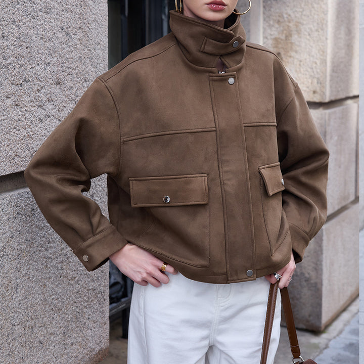 Women’s short jacket made of velour imitation with high funnel collar and flap pockets Mune Fashion