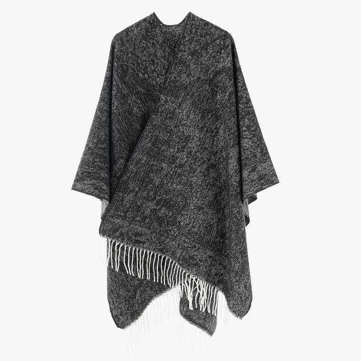 Women's poncho made of wool blend knit with fringes and wide oversized cut Mune Fashion