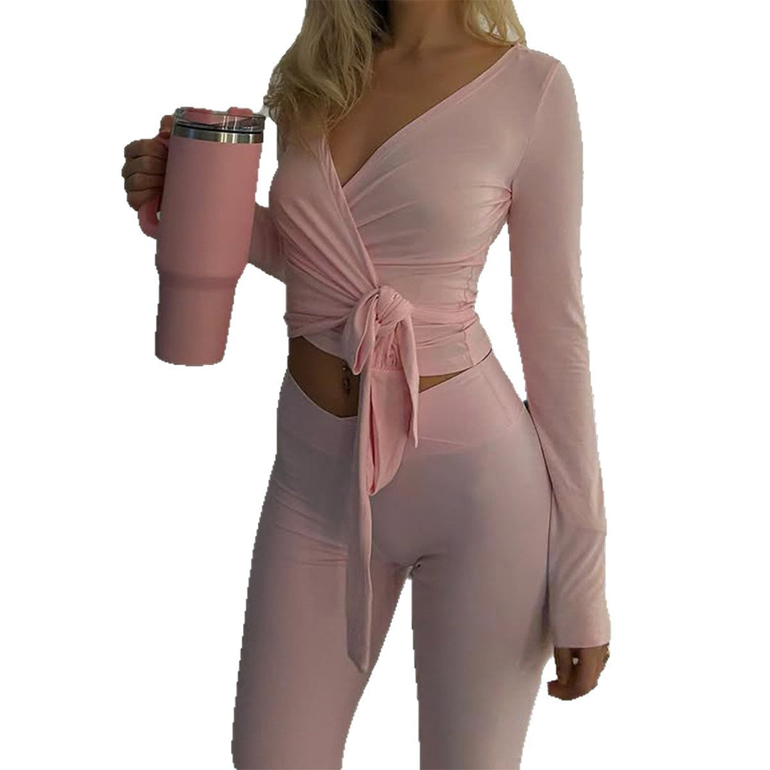 Women’s wrap crop top with knot waistband and high waist bootcut leggings set Mune Fashion