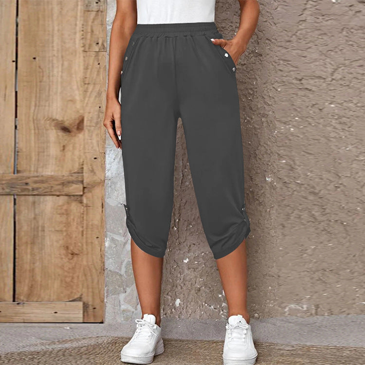 Women's casual three-quarter length pants with elastic waistband, side pockets and roll-up hem Mune Fashion