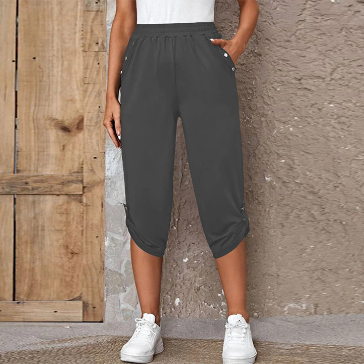 Women's casual three-quarter length pants with elastic waistband, side pockets and roll-up hem Mune Fashion