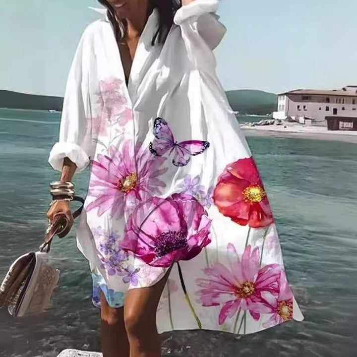 Women's airy beach dress kaftan with tropical leaf print and wide cut Mune Fashion
