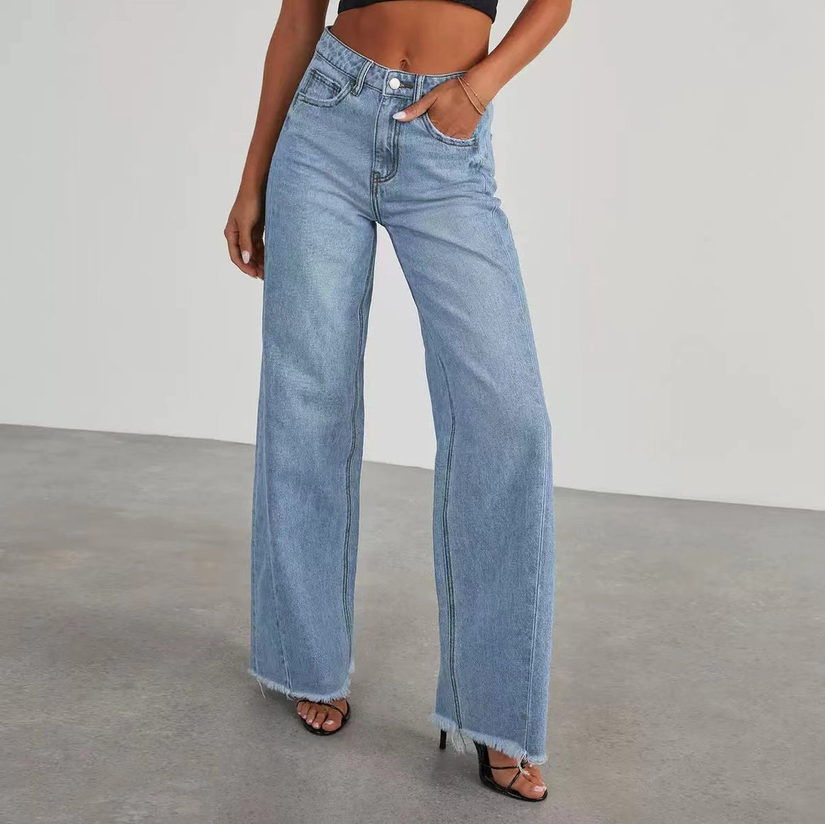 Women high-waist jeans with wide leg and frayed hem Mune Fashion