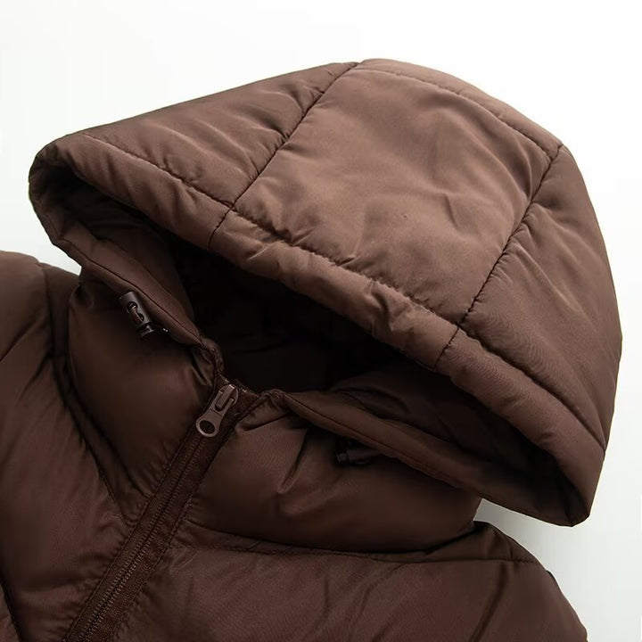 Women's hybrid quilted jacket with padding, hood, and elastic sleeve inserts Mune Fashion