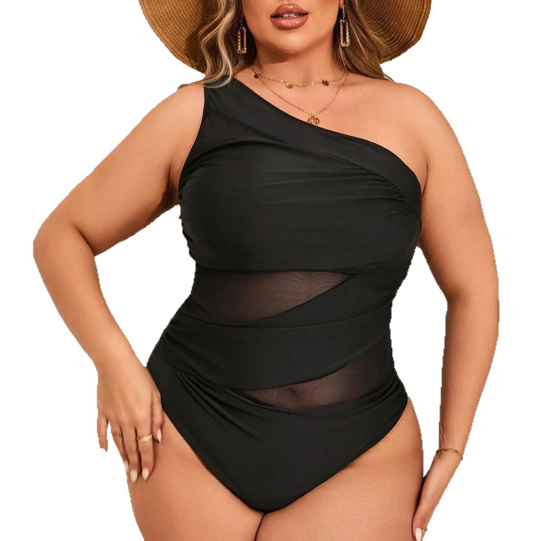 Women's jumpsuit with asymmetrical cut and transparent mesh detail Mune Fashion