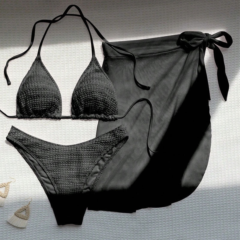 Women's bikini set with elegant wrap skirt and deep V-neck Mune Fashion