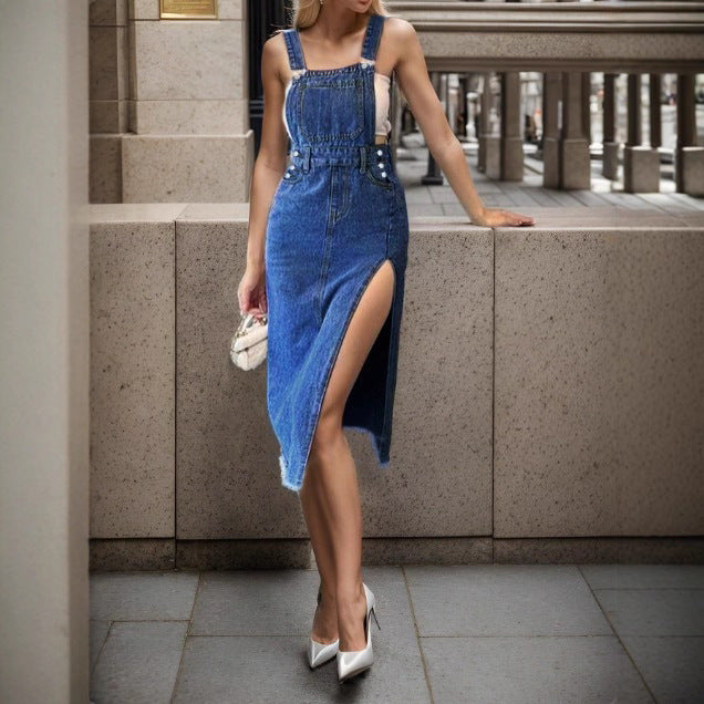 Women's denim dungaree dress with a tailored silhouette, adjustable straps, and high side slit Mune Fashion