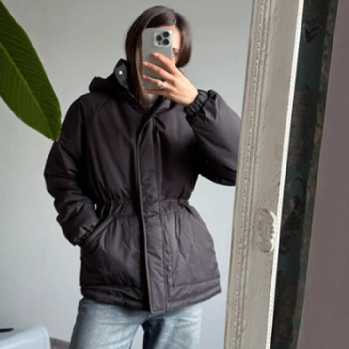Women’s quilted parka with high collar, fitted drawstring and hood Mune Fashion