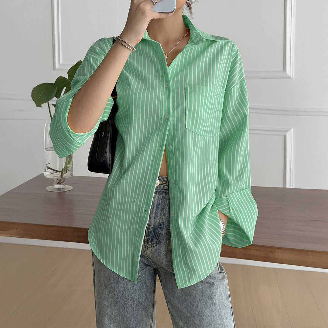 Women's oversized shirt blouse with boxy cut, breast pocket, and rounded hem Mune Fashion