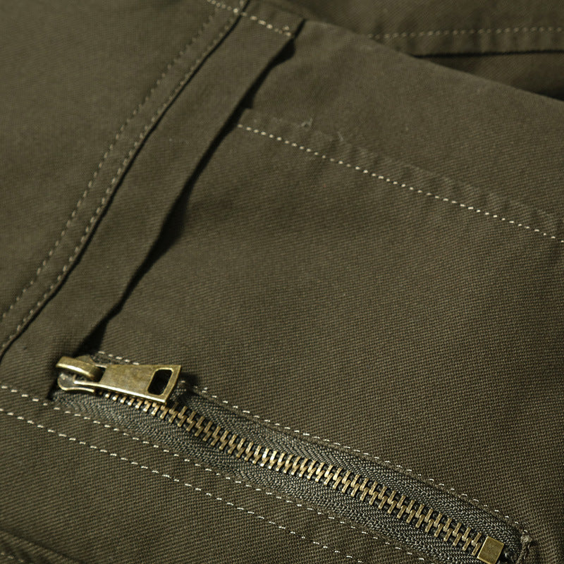 Men's canvas bomber jacket with checked lining, stand collar and badge appliqués Mune Fashion