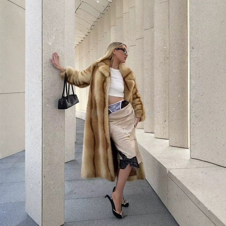 Women’s longer luxurious fur coat with wide lapels and concealed button placket Mune Fashion