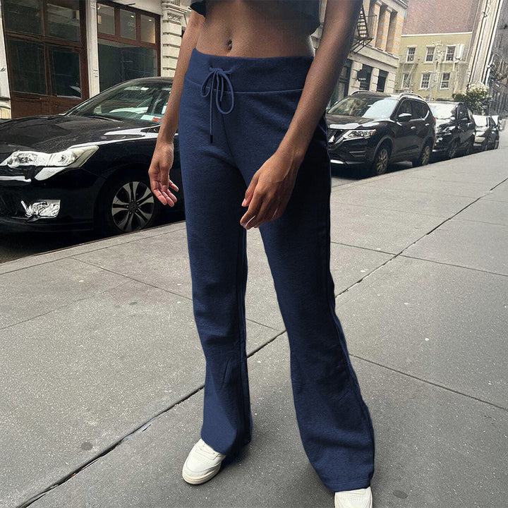 Women's high-waisted lounge pants with drawstring, flared leg, and soft sweat material Mune Fashion