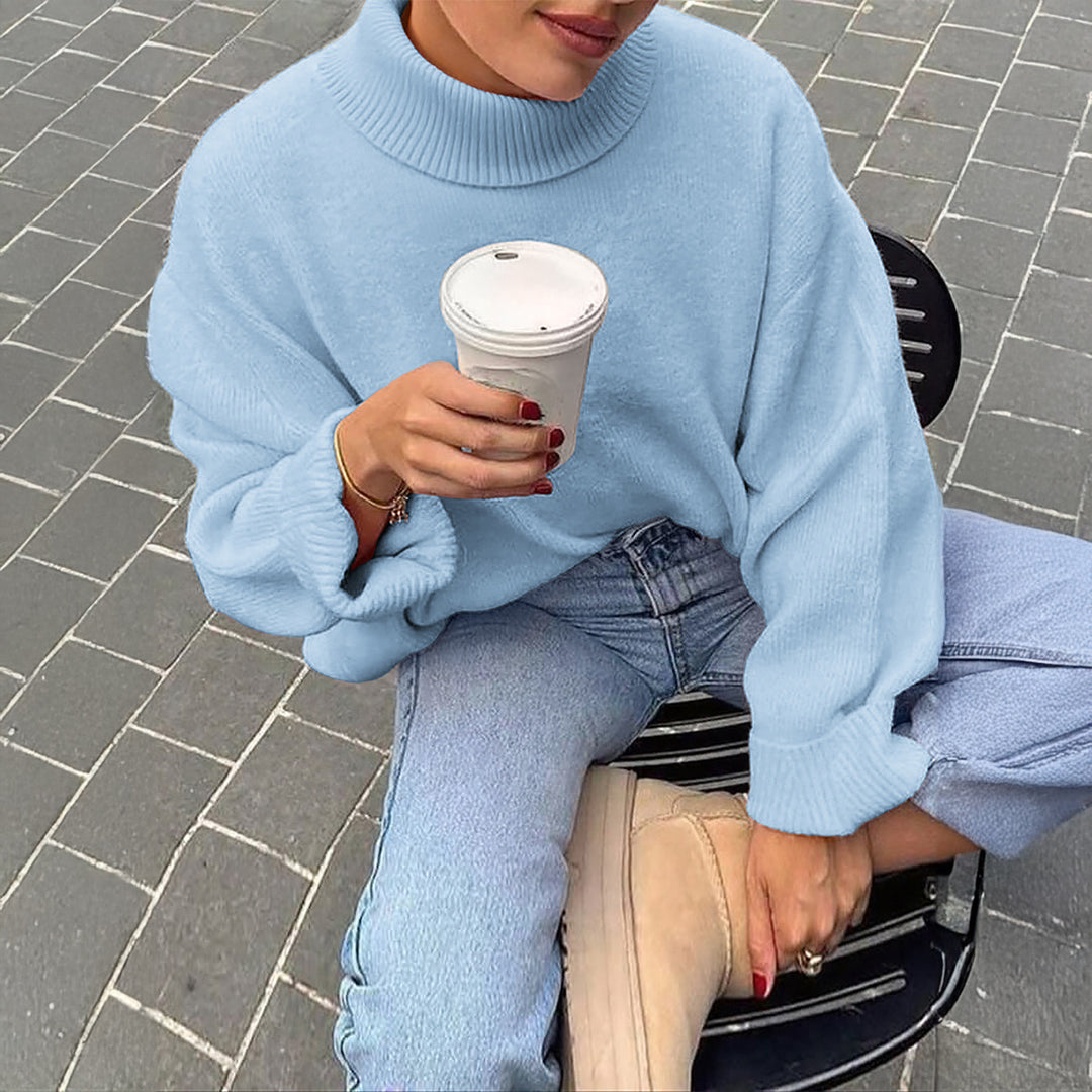 Women's oversized turtleneck sweater with wide ribbed collar, voluminous balloon sleeves, and extended cuffs Mune Fashion