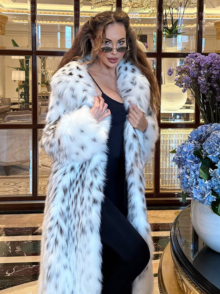 Women's luxurious long plush faux fur coat with opulent fur collar and speckled design Mune Fashion