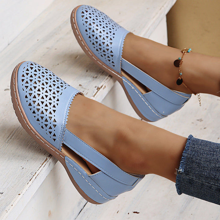 Women's perforated slipper pumps with side cut-outs, elastic heel strap, and cushioning comfort sole Mune Fashion
