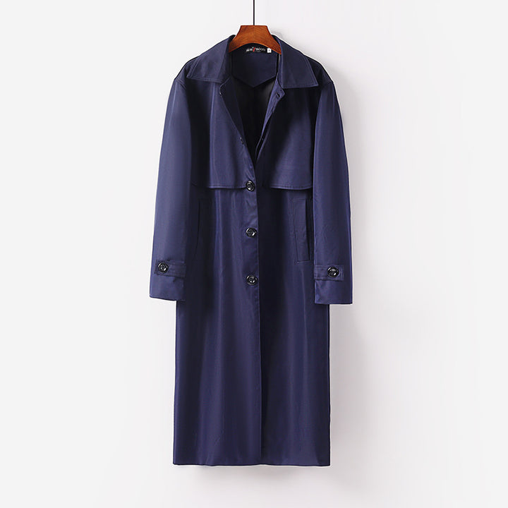 Women's lightweight trench coat with concealed button placket and shoulder cape Mune Fashion