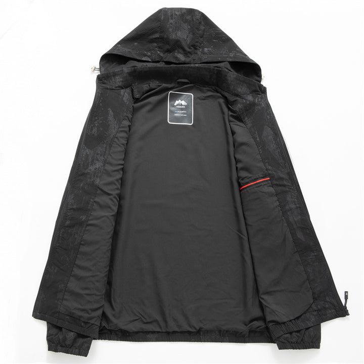 Men's lightweight softshell transitional jacket with hood, water-repellent coating and reflective zippered pockets Mune Fashion