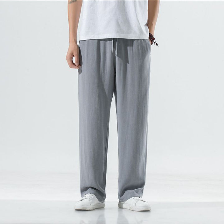 Men's light linen pants with elastic waistband, wide leg, and side pockets Mune Fashion