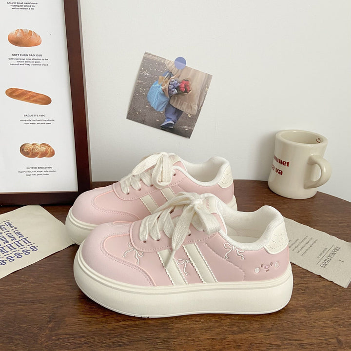 Women's platform sneakers with playful design details and comfortable cushioning Mune Fashion