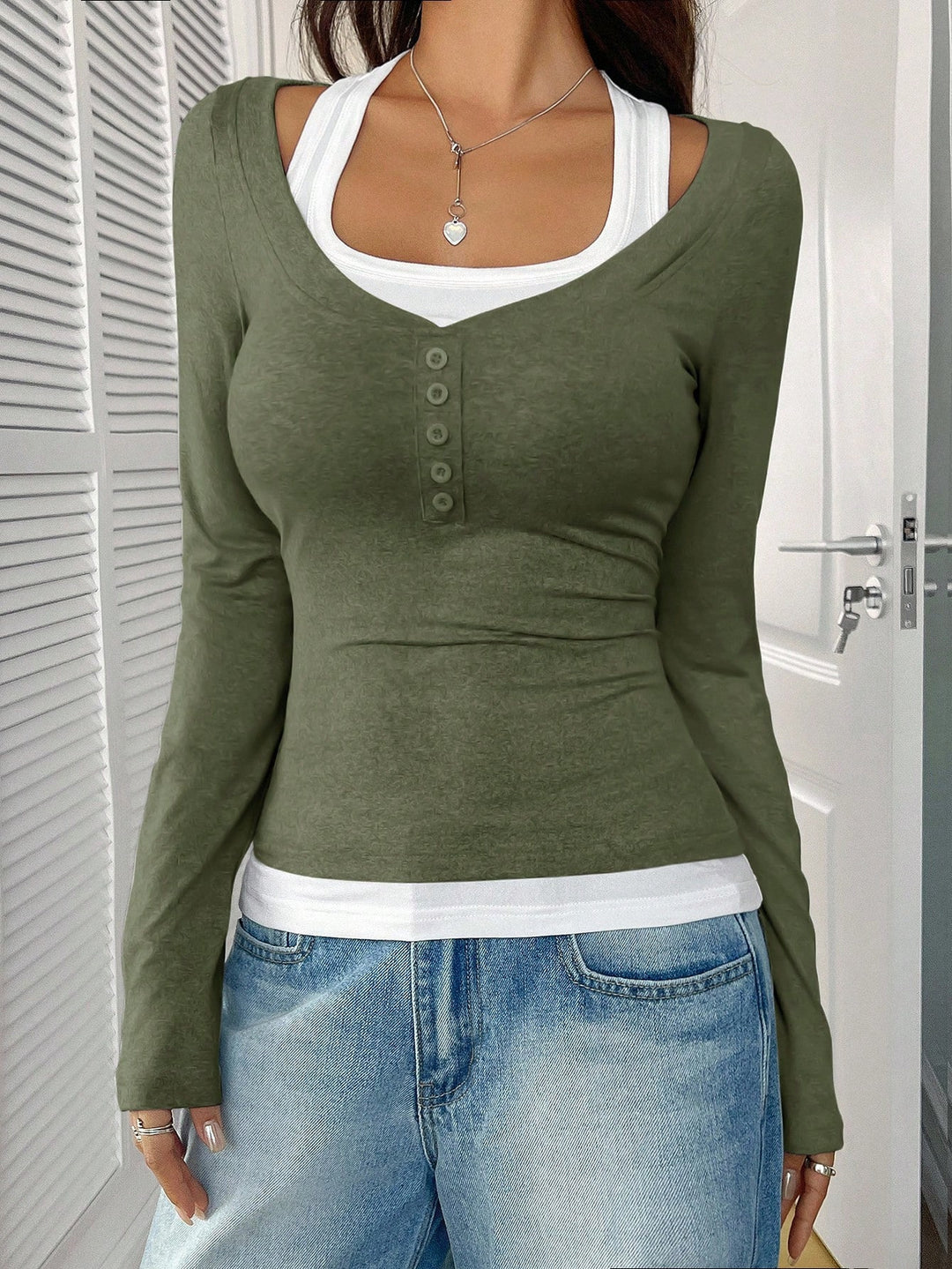Women's fitted long-sleeve Henley shirt with deep U-neck and button placket Mune Fashion