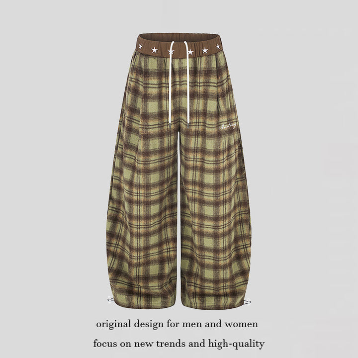 Women's Extra Wide Checked Palazzo Lounge Pants made of soft fleece with star-embellished comfort waistband, drawstring and adjustable hem.