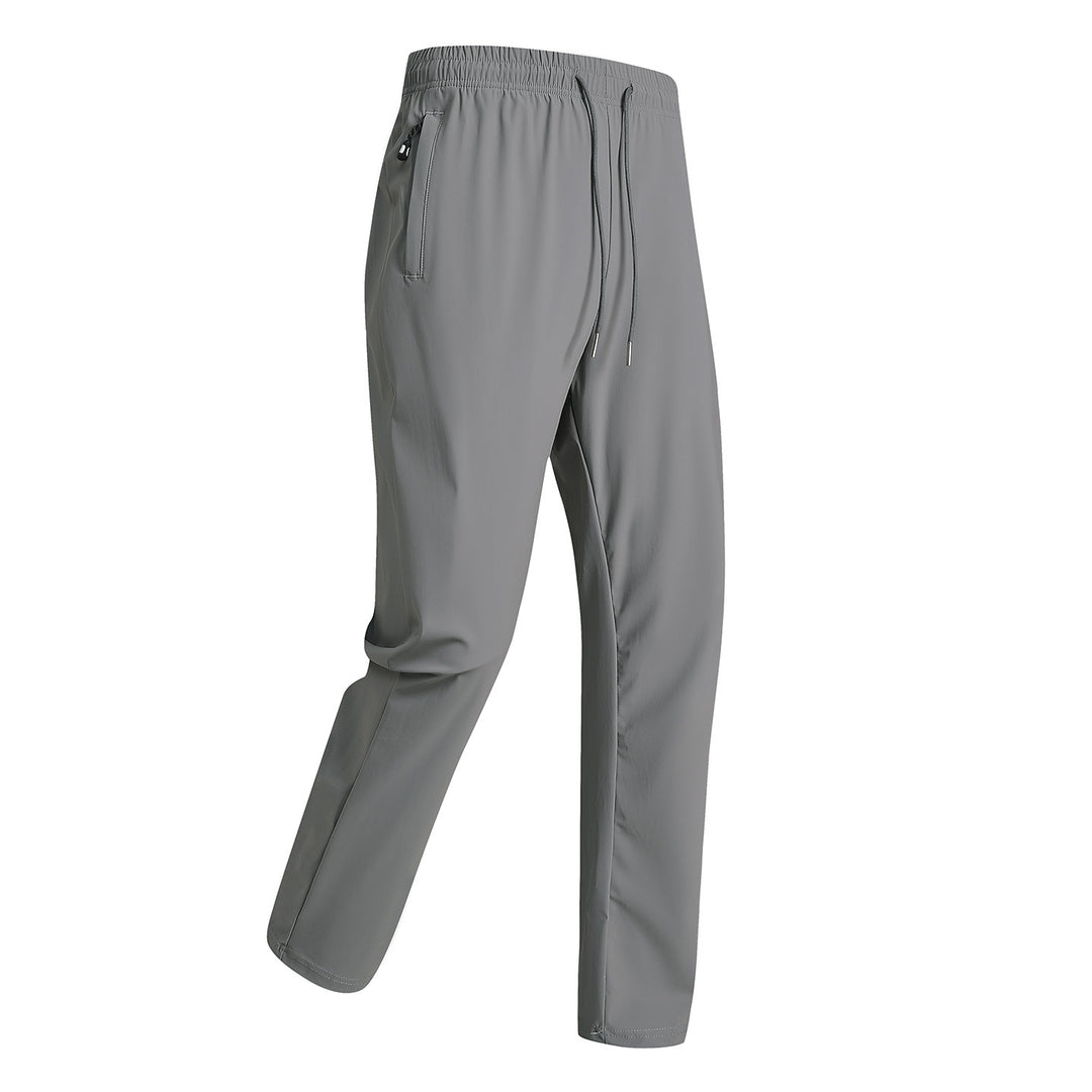 Men's sporty training pants with elastic waistband and zippered pockets Mune Fashion