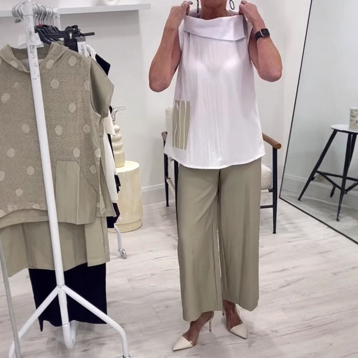 Women's sleeveless blouse top with wide shawl collar, relaxed A-line and side decorative yoke Mune Fashion