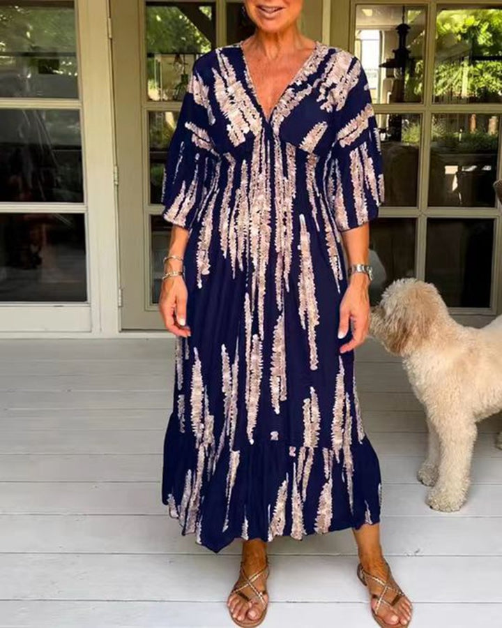 Ladies' V-neck maxi dress with brushstroke pattern, gathered underbust, balloon sleeves, and ruffled tiers Mune Fashion