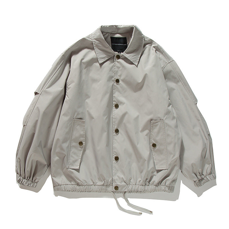 Unisex Boxy transitional bomber jacket with drawstring hem and snap button placket Mune Fashion
