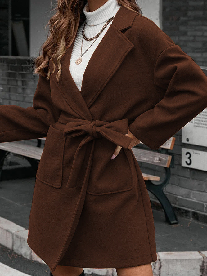 Ladies wrap coat with tie belt, large flap pocket and lapel collar Mune Fashion