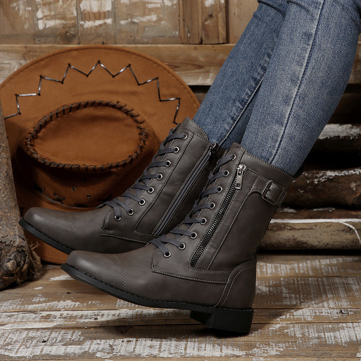 Women's robust lace-up biker ankle boots with side zipper and decorative strap Mune Fashion