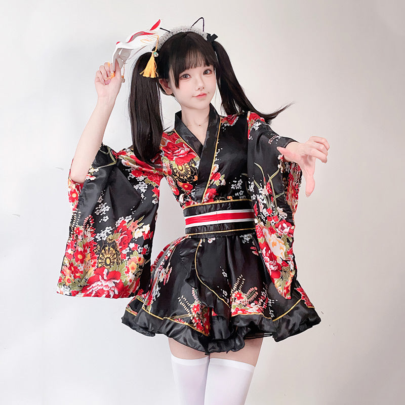 Ladies Kimono Dress with a playful cut and floral accents Mune Fashion