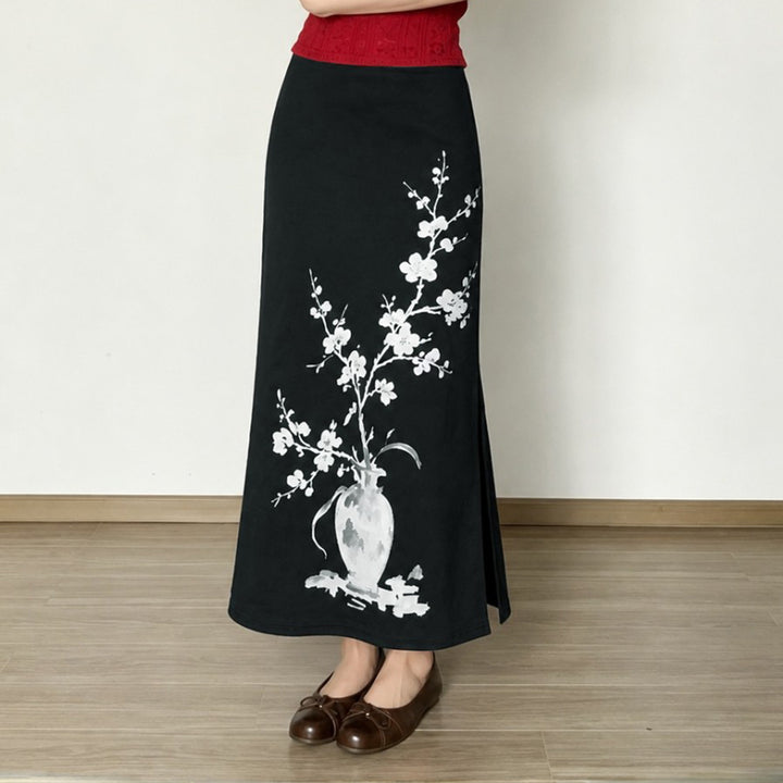 Women's flared maxi skirt with A-line cut, elastic waistband, and floral watercolor vase print Mune Fashion