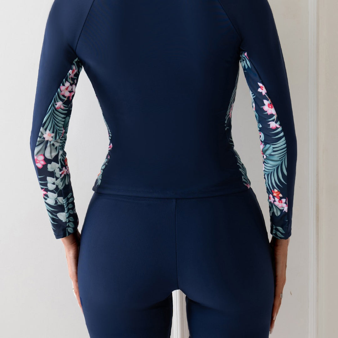 Women’s surf suit with long sleeves and floral accents Mune Fashion