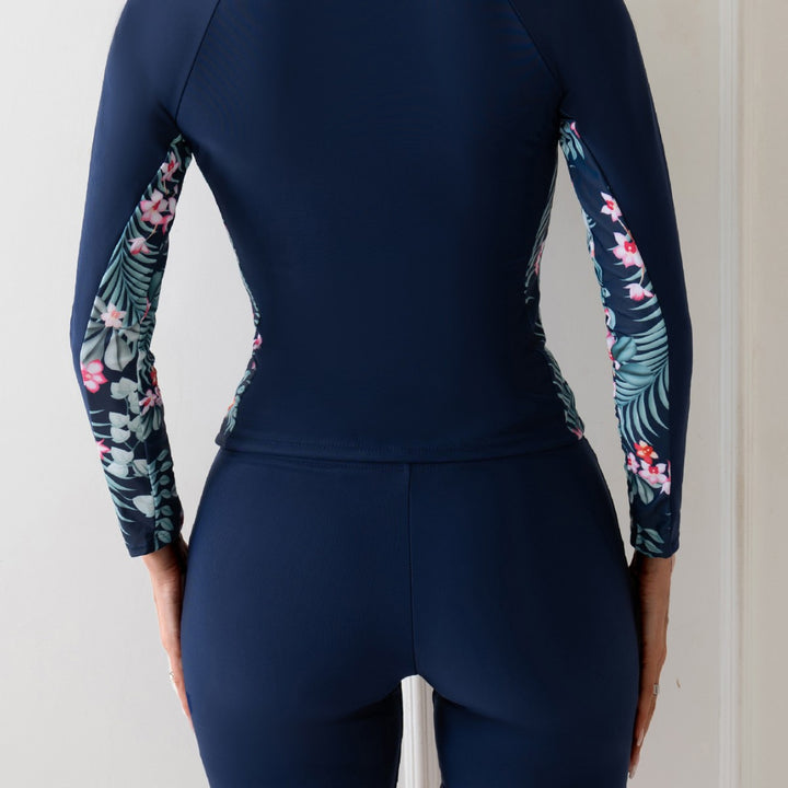 Women’s surf suit with long sleeves and floral accents Mune Fashion