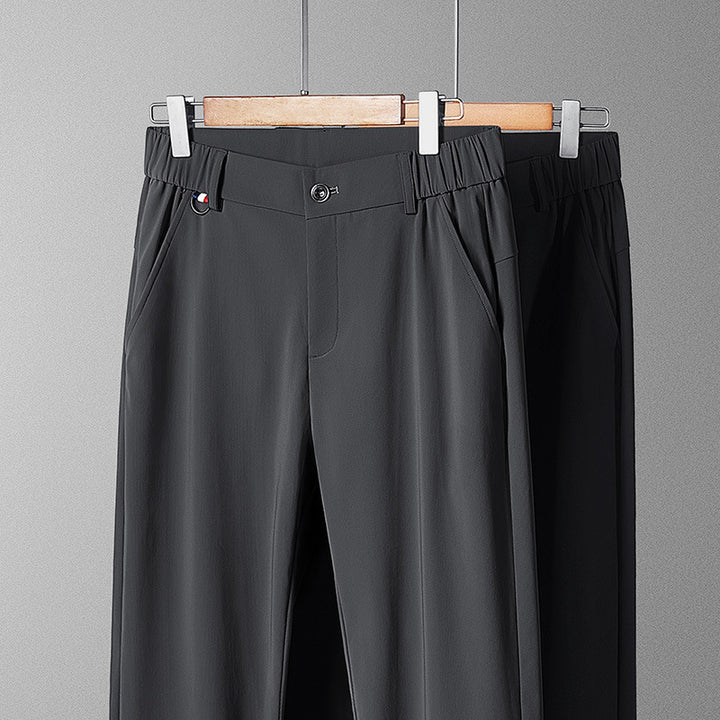 Men's lightweight travel pants with elastic waistband, straight leg, zipper details, and side pockets Mune Fashion
